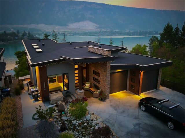 Capture the essence of lakeside living at this stunning home, a mere stone's throw from the pristine Kalamalka and Wood Lakes in Lake Country's Oyama region. Built in 2021, this contemporary masterpiece is replete with top-tier upgrades. The expansive open-concept living area features towering windows that drink in the lake vistas, while a gas fireplace with a bespoke tiled accent wall adds warmth. Step onto the incredible covered deck, a true outdoor haven complete with an outdoor kitchen space, a natural gas fire-table enclave, ample seating, and sleek glass railings that frame unobstructed views of Kal Lake. The kitchen boasts double skylights, wall ovens, a gas range, and custom two-toned cabinetry. The master suite on the main floor is a sanctuary of indulgence, with a walk-in closet and a private 5-piece ensuite. His-and-her sinks and a lake-view soaker tub elevate the experience. An additional bedroom or office on the main floor, along with a powder room, offers versatility. Intelligent design shines with the Control-4 system, seamlessly integrating smart-home lighting and sound. The practical mudroom/laundry area conveniently connects to the garage, streamlining daily life. Discover a harmonious blend of contemporary luxury and natural splendor, all in the heart of a lakeside paradise.

Call me today or visit petrina.ca!
